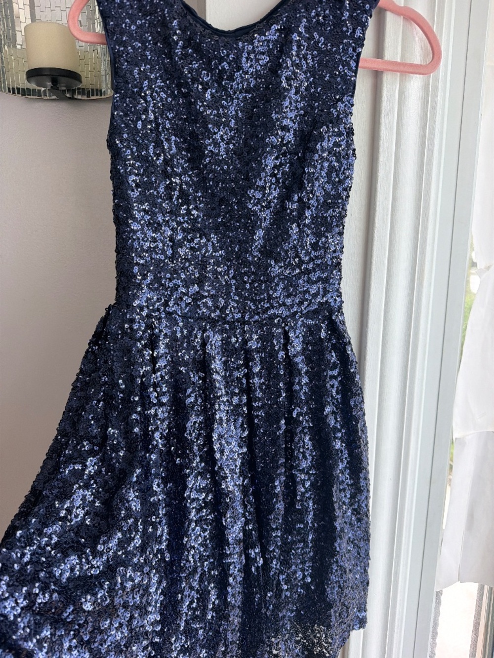 Emerald Sundae dress featuring a striking dark blue sequin design.